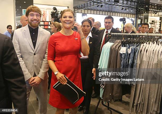 Crown Princess Victoria of Sweden smiles during a visit to H&M store at Jockey Plaza on October 19, 2015 in Lima, Peru.