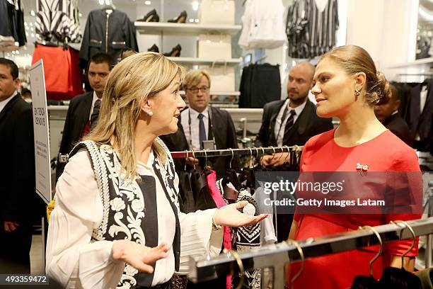 Crown Princess Victoria of Sweden visit a H&M store at Jockey Plaza on October 19, 2015 in Lima, Peru.