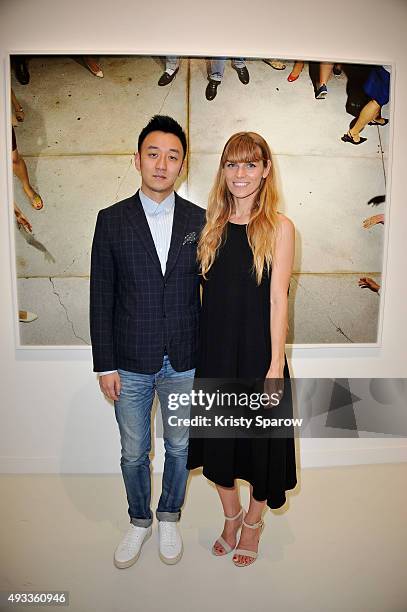 Lu Xun and Alex Prager attend the 'Alex Prager Exibition' Press Preview at Galeries Lafayette on October 19, 2015 in Paris, France.