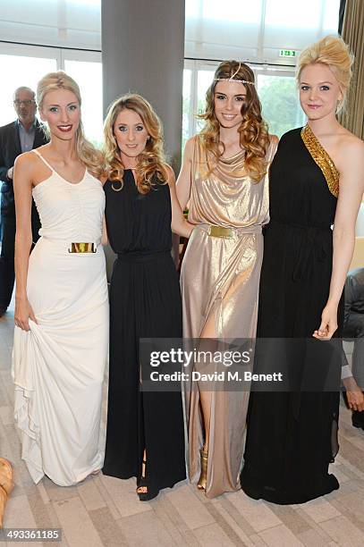 Chloe Roberts, Camille Marchetti, Paola Ruiz and Emilia Pikkarainen attend the Amber Lounge 2014 Gala at Le Meridien Beach Plaza Hotel on May 23,...