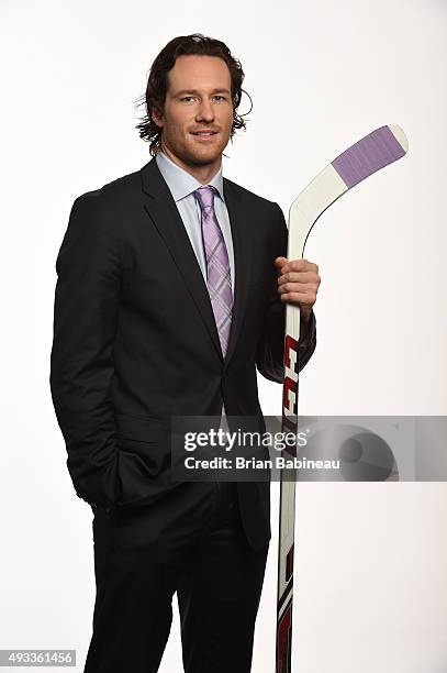 Duncan Keith of the Chicago Blackhawks poses for pictures at the NHL Player Media Tour at the Ritz Carlton on September 9, 2015 in Toronto, Ontario.