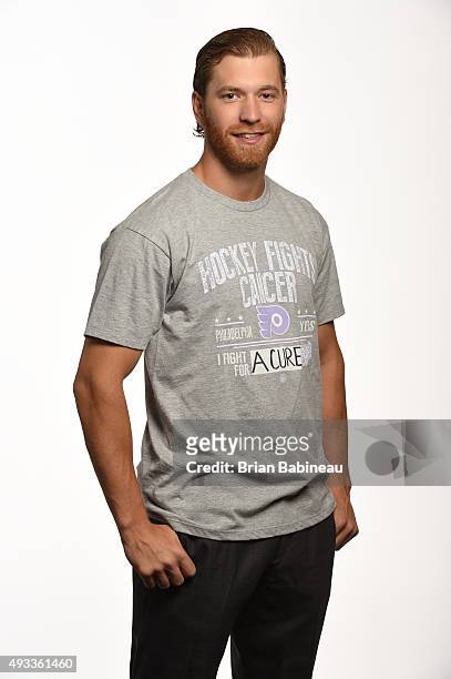 Claude Giroux of the Philadelphia Flyers poses for a portrait at the NHL Player Media Tour at the Ritz Carlton on September 8, 2015 in Toronto,...