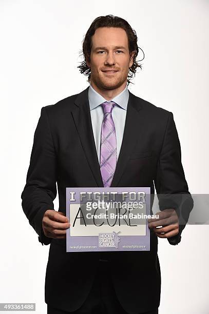 Duncan Keith of the Chicago Blackhawks poses for pictures at the NHL Player Media Tour at the Ritz Carlton on September 9, 2015 in Toronto, Ontario.