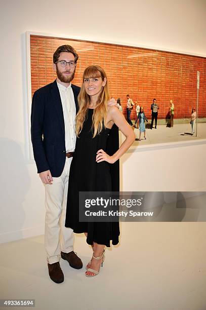 Simon Dargan and Alex Prager attend the 'Alex Prager Exibition' Press Preview at Galeries Lafayette on October 19, 2015 in Paris, France.