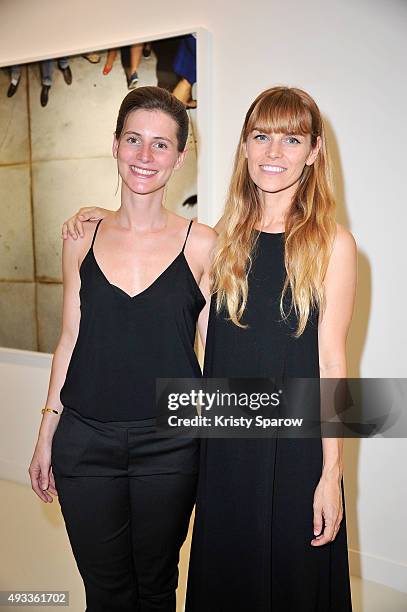 Elsa Jensen and Alex Prager attend the 'Alex Prager Exibition' Press Preview at Galeries Lafayette on October 19, 2015 in Paris, France.