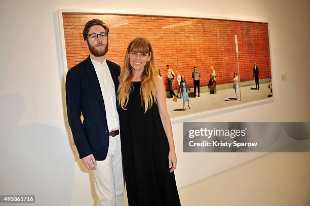 Simon Dargan and Alex Prager attend the 'Alex Prager Exibition' Press Preview at Galeries Lafayette on October 19, 2015 in Paris, France.