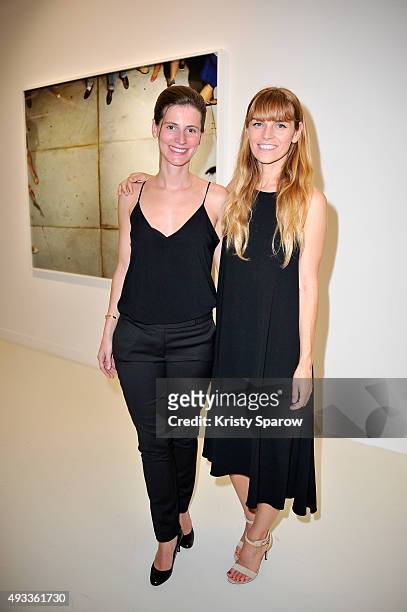 Elsa Jensen and Alex Prager attend the 'Alex Prager Exibition' Press Preview at Galeries Lafayette on October 19, 2015 in Paris, France.