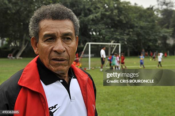 Peruvian football legend Hector Chumpitaz talks at his football academy in Lima on May 20, 2014 about the upcoming 50th anniversary of the tragedy in...