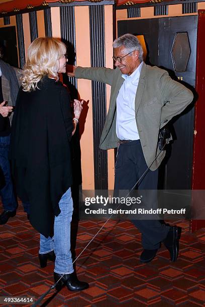 Nathalie Delon and Photographer Jean-Marie Perier pose after the 'Flash-Back' : Jean-Marie Perier's One Man Show at Theatre de la Michodiere on...