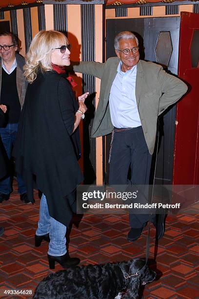 Nathalie Delon and Photographer Jean-Marie Perier pose after the 'Flash-Back' : Jean-Marie Perier's One Man Show at Theatre de la Michodiere on...