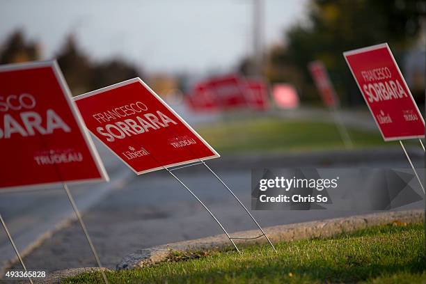 Signs for Liberal candidate Francesco Sorbara bend under gusty prevailing winds. Sorbara is challenging Progressive Conservative incumbent Julian...