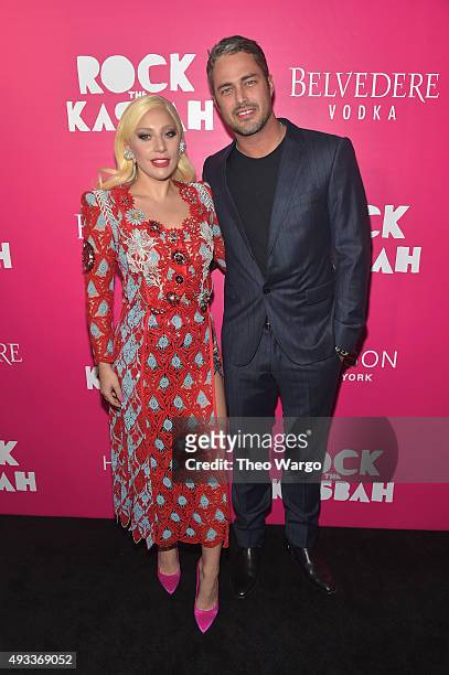 Lady Gaga and Taylor Kinney attend the "Rock The Kasbah" New York Premiere at AMC Loews Lincoln Square 13 theater on October 19, 2015 in New York...
