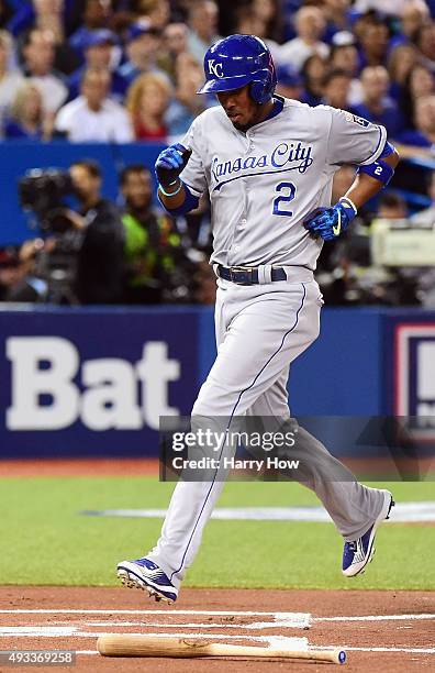 Alcides Escobar of the Kansas City Royals scores a run in the first inning against the Toronto Blue Jays during game three of the American League...