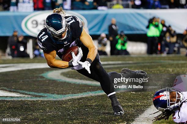 Riley Cooper of the Philadelphia Eagles dives across the goaline for a first quarter touchdown against the New York Giants at Lincoln Financial Field...