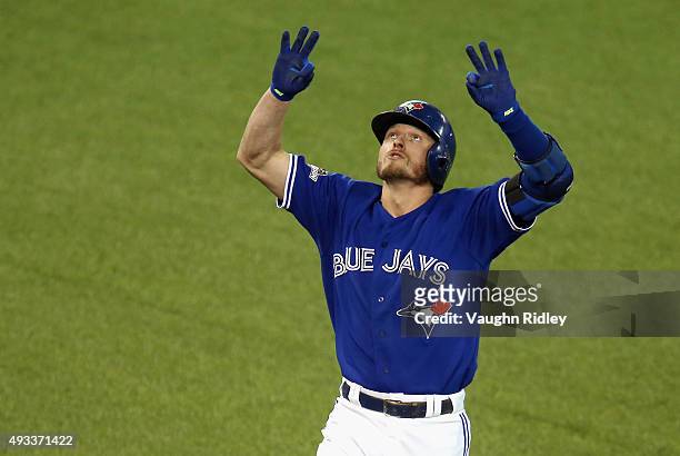 Josh Donaldson of the Toronto Blue Jays celebrates after hitting a two-run home run in the third inning against the Kansas City Royals during game...