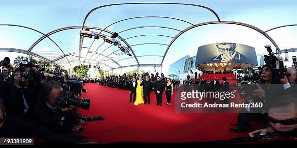 Panorama showing photographers in the foreground and producer Lawrence Bender with actress Uma Thurman, director Quentin Tarantino, actor John...