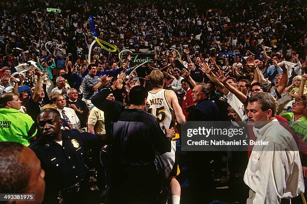 Rik Smits of the Indiana Pacers celebrates after hitting the game winning shot against the Orlando Magic during Game Four of the Eastern Conference...