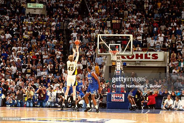 Rik Smits of the Indiana Pacers shoots the game winning shot against the Orlando Magic during Game Four of the Eastern Conference Finals on May 29,...