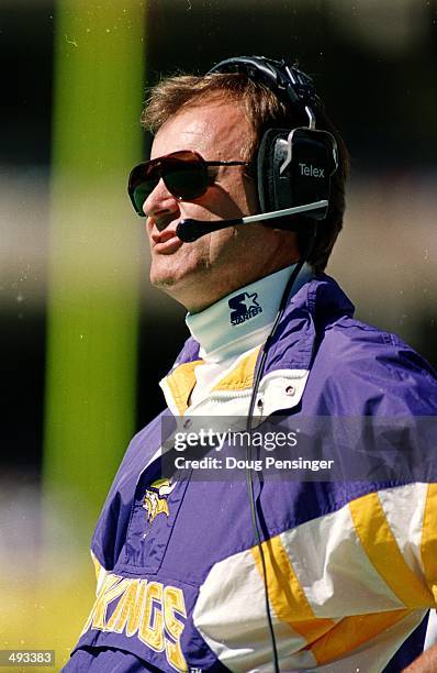 Offensive Coordinator Brian Billick of the Minnesota Vikings looks on during the game against the Pittsburgh Steelers at the Tree Rivers Stadium in...
