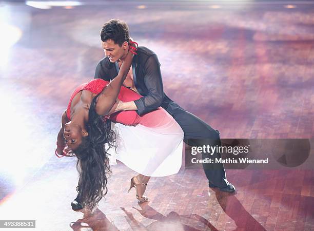 Motsi Mabuse and Evgenij Voznyuk attend the 8th Show of 'Let's Dance' on May 23, 2014 in Cologne, Germany.