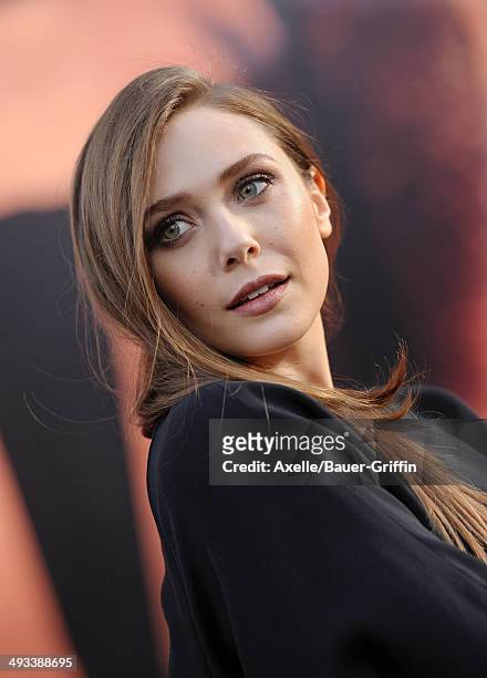 Actress Elizabeth Olsen arrives at the Los Angeles premiere of 'Godzilla' at Dolby Theatre on May 8, 2014 in Hollywood, California.