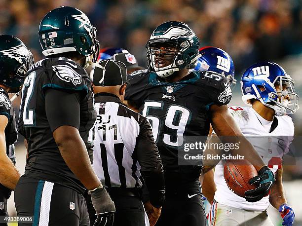 DeMeco Ryans of the Philadelphia Eagles recovers a fumble during the second quarter against the New York Giants at Lincoln Financial Field on October...