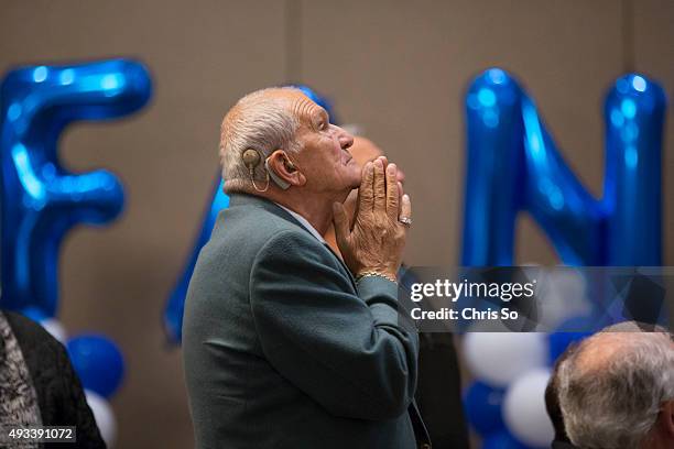 Julian Fantino supporter Frank Padula follows the election results projected at Fontana Primavera Event Centre in the Vaughan-Woodbridge after the...