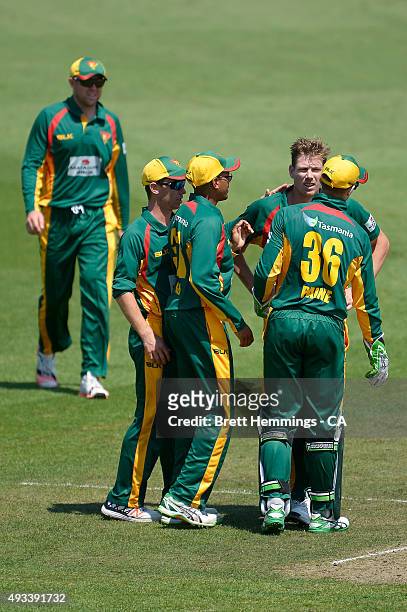 James Faulkner of Tasmania celebrates after taking the wicket of Matthew Wade of Victoria during the Matador BBQs One Day Cup match between Tasmania...