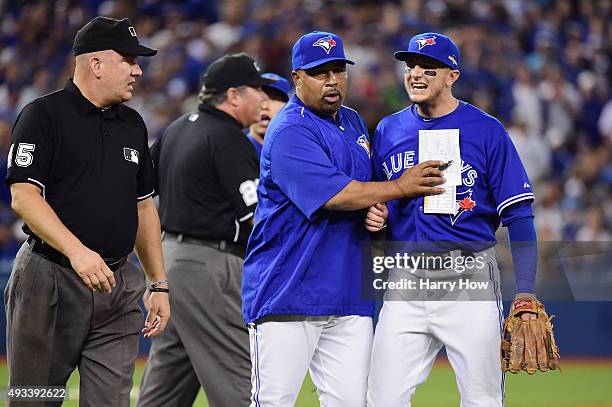 Troy Tulowitzki of the Toronto Blue Jays reacts as he is ejected from the game in the eighth inning against the Kansas City Royals during game three...