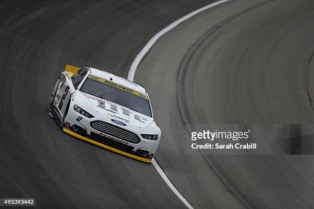 Brad Keselowski, driver of the Miller Lite Ford, practices for the NASCAR Sprint Cup Series myAFibRisk.com 400 at Chicagoland Speedway on September...