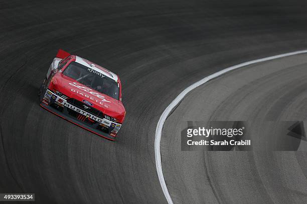 Ryan Reed, driver of the Lilly/American Diabetes Association Ford, practices for the NASCAR Xfinity Series Furious 7 300 at Chicagoland Speedway on...