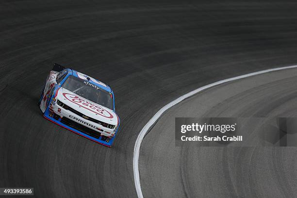 Brian Scott, driver of the Jewel-Osco/Kraft Singles Chevrolet, practices for the NASCAR Xfinity Series Furious 7 300 at Chicagoland Speedway on...