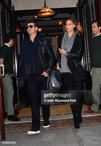 Robin Thicke and April Love Geary are seen walking in Soho on October 19, 2015 in New York City.