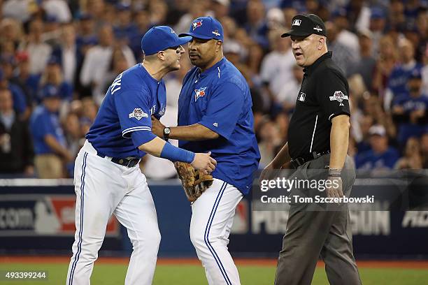 Troy Tulowitzki of the Toronto Blue Jays reacts as he is ejected from the game in the eighth inning against the Kansas City Royals during game three...