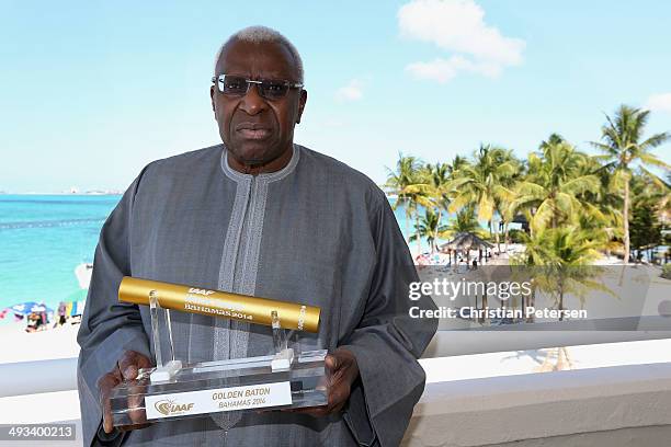 President Lamine Diack holds the 2014 IAAF Golden Baton ahead of the IAAF World Relays at the Melia Hotel on May 23, 2014 in Nassau, Bahamas.