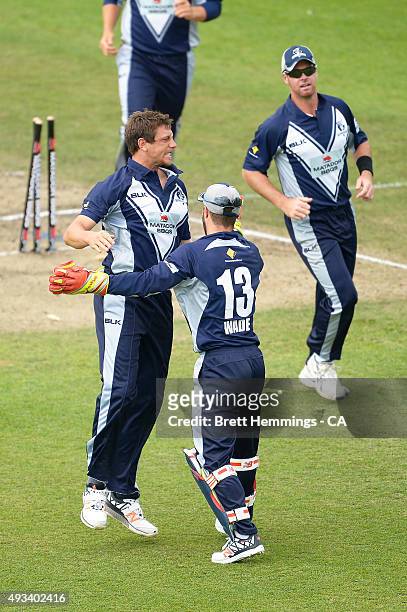 James Pattinson of Victoria celebrates after taking the wicket of Ben Dunk of Tasmania during the Matador BBQs One Day Cup match between Tasmania and...