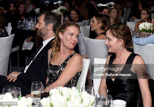 Director Judd Apatow and actresses Leslie Mann and Dakota Johnson attend the 22nd Annual ELLE Women in Hollywood Awards presented by Calvin Klein...