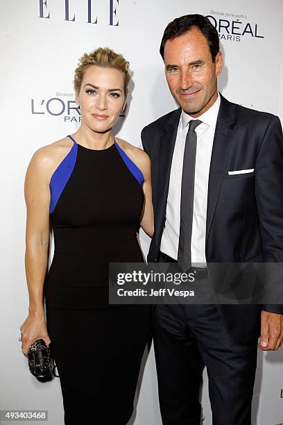 Actress Kate Winslet and ELLE Senior Vice President, Publisher, and Chief Revenue Officer Kevin C. O'Malley attend the 22nd Annual ELLE Women in...
