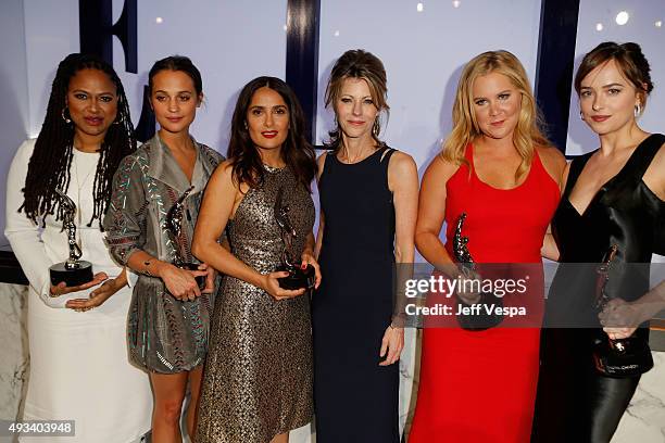 Honorees Ava DuVernay, Alicia Vikander, and Salma Hayek, ELLE Editor-in-Chief Robbie Myers, and honorees Amy Schumer, and Dakota Johnson pose onstage...