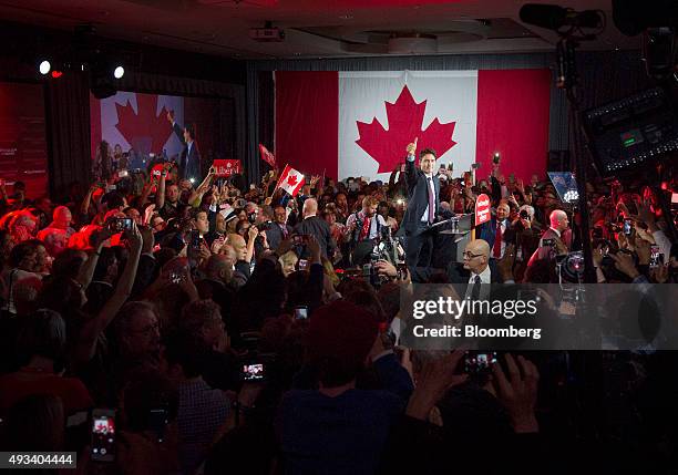 Justin Trudeau, Canada's prime minister-elect and leader of the Liberal Party of Canada, gestures to supporters on election night in Montreal,...