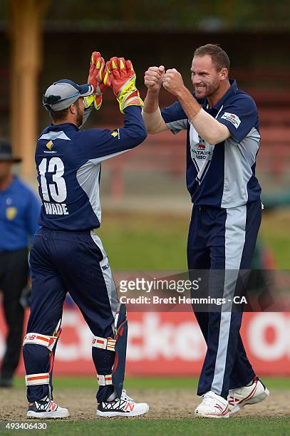 John Hastings of Victoria celebrates after taking the wicket of James Faulkner of Tasmania during the Matador BBQs One Day Cup match between Tasmania...