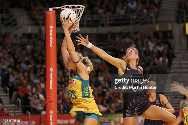 Caitlin Bassett of Australia battles with Leana de Bruin of New Zealand during the International Test match between the New Zealand Silver Ferns and...