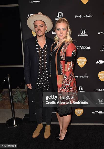 Actor Evan Ross and singer Ashlee Simpson attend the Guitar Hero Live Launch Party at YouTube Space LA on October 19, 2015 in Los Angeles, California.