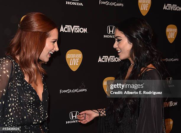 Actors Ashley Tisdale and Vanessa Hudgens attend the Guitar Hero Live Launch Party at YouTube Space LA on October 19, 2015 in Los Angeles, California.