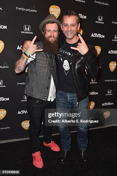 Game designer Jamie Jackson and Activision CEO Eric Hirshberg attend the Guitar Hero Live Launch Party at YouTube Space LA on October 19, 2015 in Los...