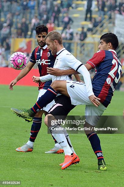 Adam Rigoni Luca Rigoni of US Città di Palermo competes the ball with Adam Masina ...