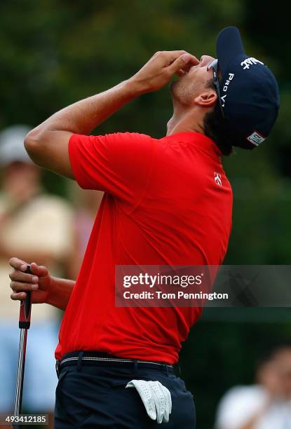 Adam Scott of Australia reacts to a missed putt on the 16th hole during Round Two of the Crowne Plaza Invitational at Colonial on May 23, 2014 at...