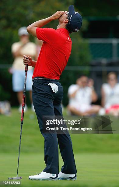 Adam Scott of Australia reacts to a missed putt on the 16th hole during Round Two of the Crowne Plaza Invitational at Colonial on May 23, 2014 at...