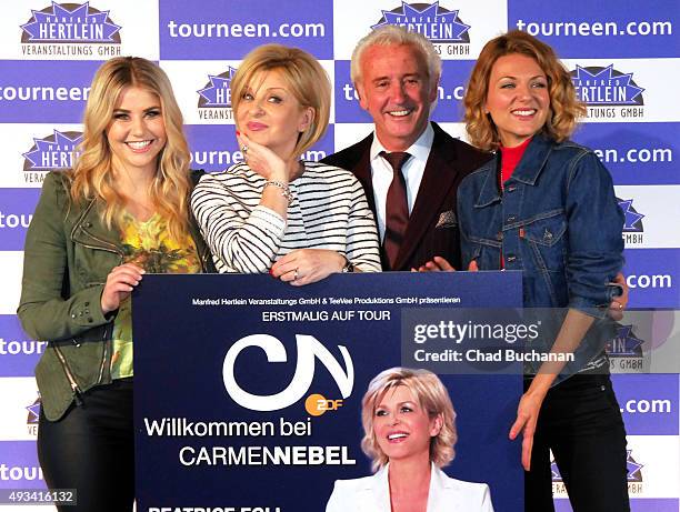 Beatrice Egli, Carmen Nebel, Tony Christie and Ella Endlich pose for photos at the 'Willkommen bei Carmen Nebel' Tour - Press Conference on October...