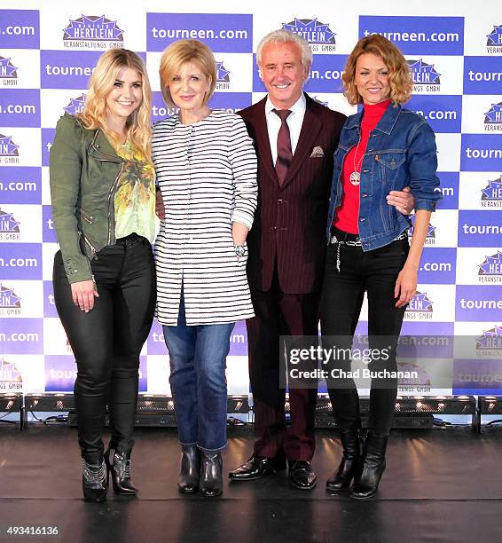 Beatrice Egli, Carmen Nebel, Tony Christie and Ella Endlich pose for photos at the 'Willkommen bei Carmen Nebel' Tour - Press Conference on October...